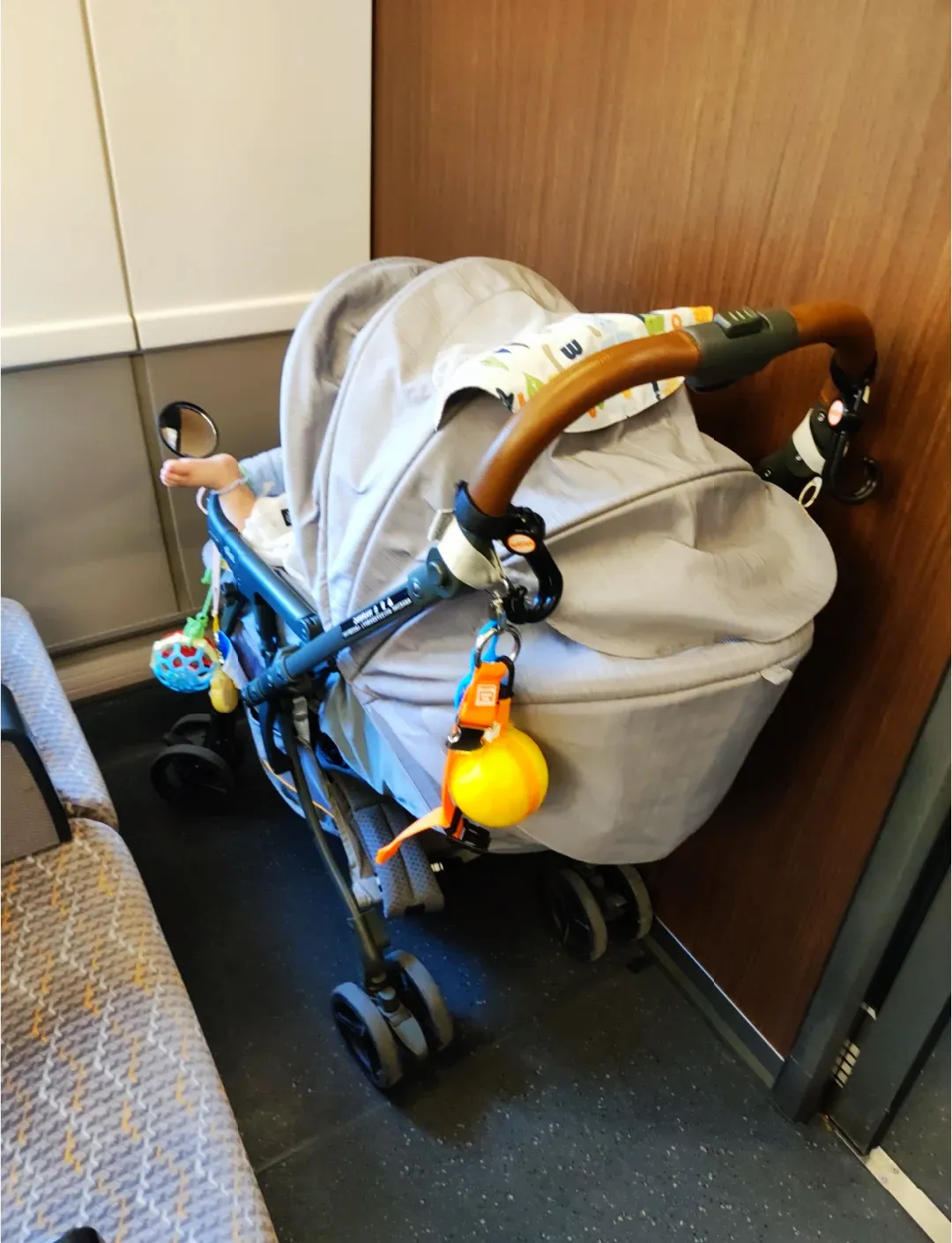 Folded Stroller Stored on Train
