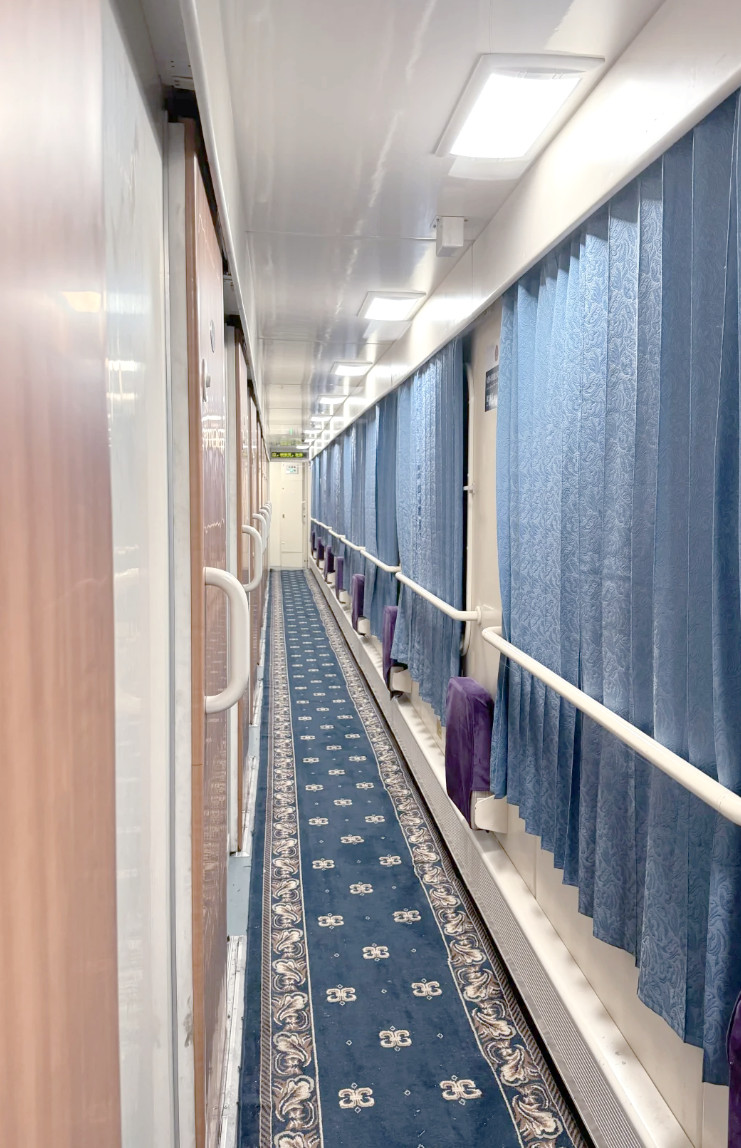Soft sleeper compartment on a conventional China train from another angle